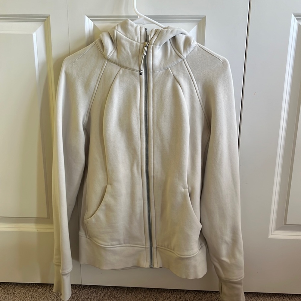 cream color lulu lemon zip up jacket